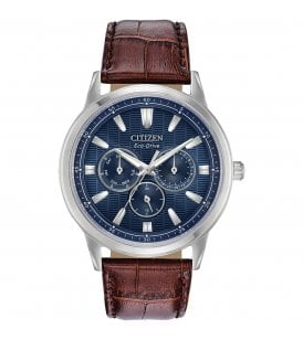 Citizen Corso  Stainless Steel Case Case Size: 44mm  Blue Pin Stripe Dial  Luminous Hands 12/24 Hour Time Analog Day/Date Sapphire Crystal Glass  Brown Leather Strap Water Resistance: 10 Bar  5 Year Manufacturers Warranty